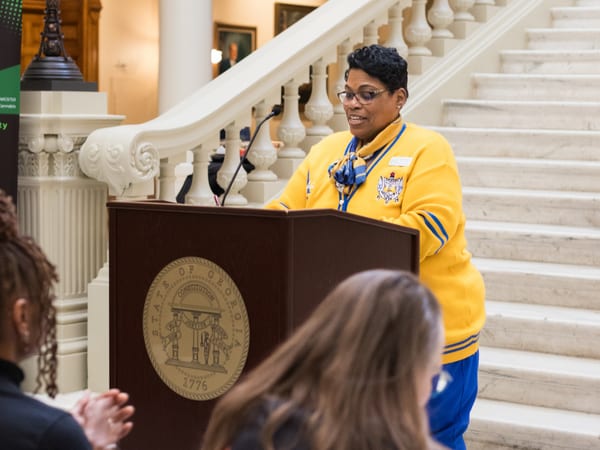Community advocates engaged in civic policy discussion